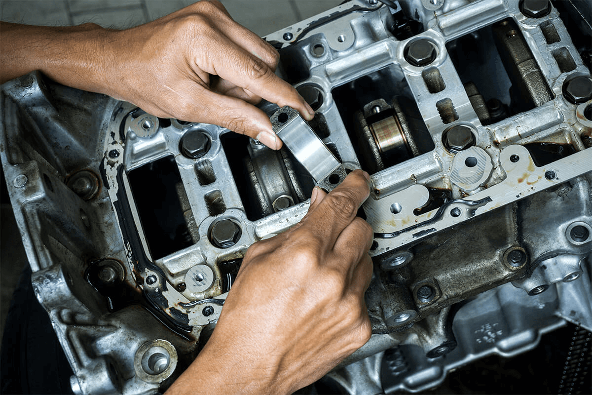A person selecting the right bearing component.