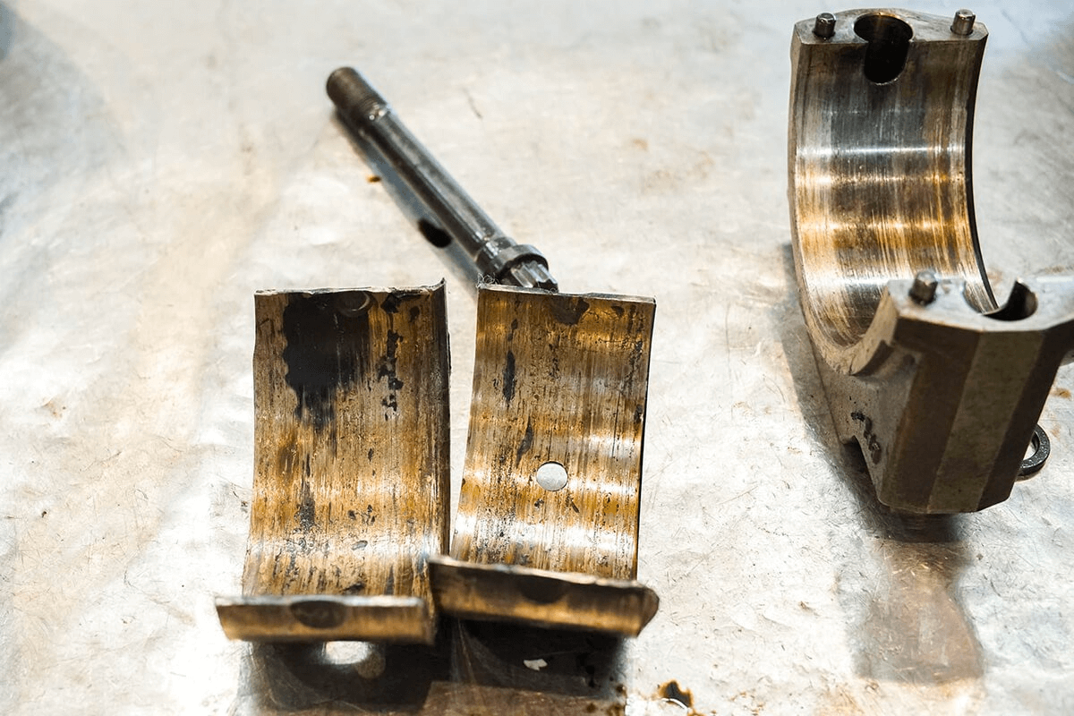A broken or worn-out industrial bearing.
